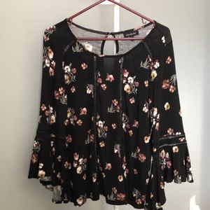 Floral blouse with cut outs. Size L